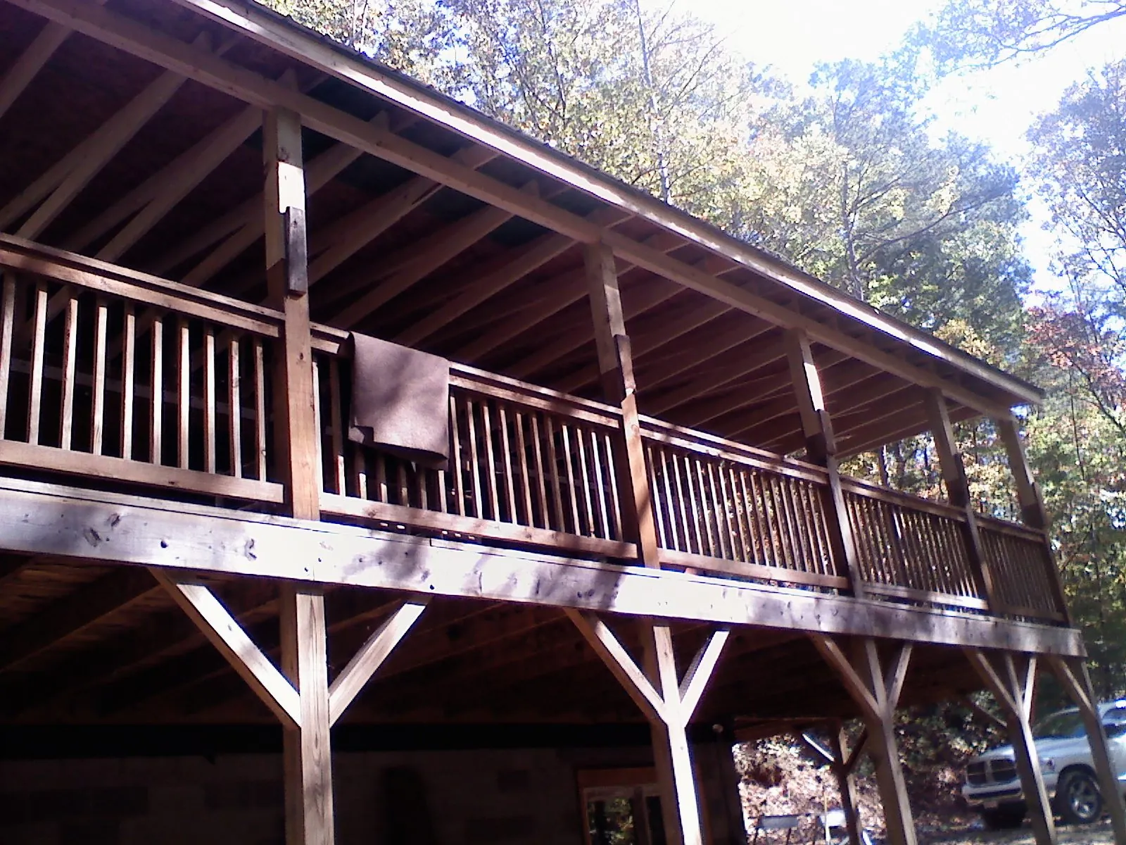 Timber framing under a new elevated porch and deck — Roof Leak Repair in Dresden by Roofing Brothers